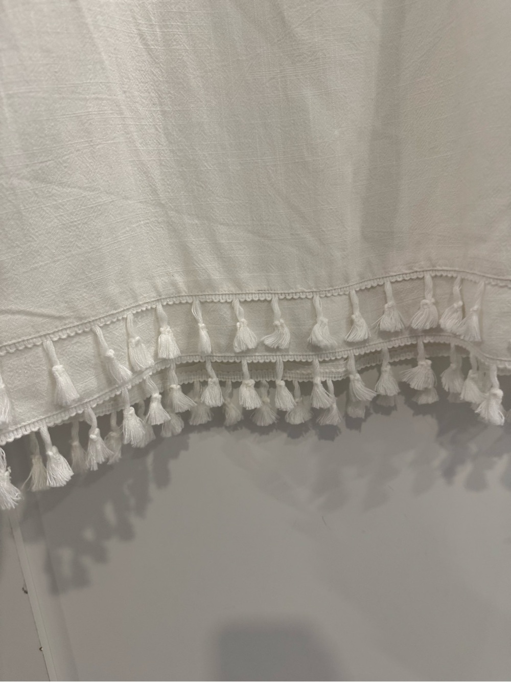 Lulu's White Tassel-Hem Mini Dress - Picture 9 of 10
